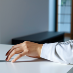 A serene professional woman in modest, comfortable home attire, gently touching her smartwatch, which displays clear health metrics. In the background, a smart speaker glows softly on a minimalist table, while automated lighting casts a warm, inviting glow throughout the modern living room. The scene emphasizes seamless technology integration for daily wellness and convenience, showcasing AI and electronics working in harmony. fully clothed, appropriate attire, safe for work, perfect anatomy, natural proportions, well-formed hands, proper finger count, natural body proportions, professional photography, high quality, family-friendly content.